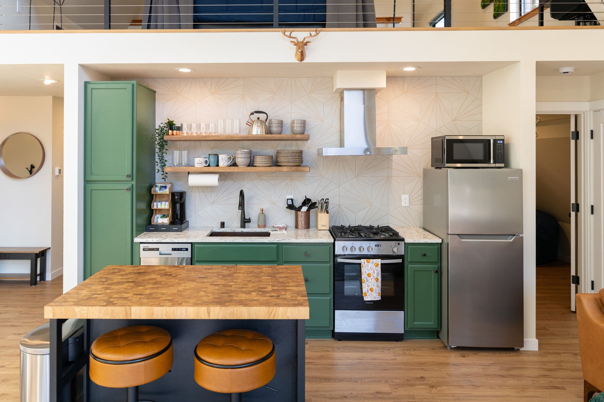Kitchen with green cabinets